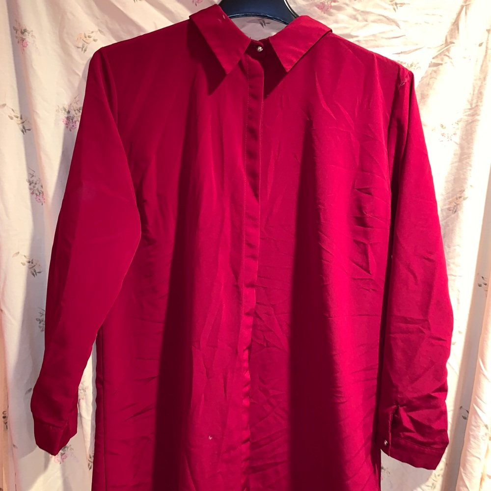Long button down blouse.